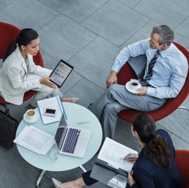 Businesspeople discussing strategy in office